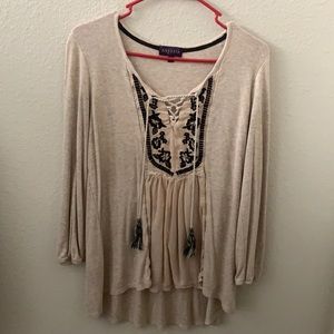 Beautiful beige peekaboos blouse